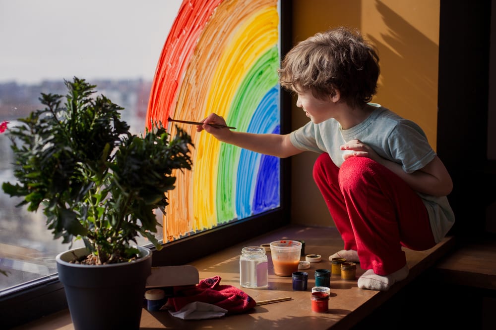 Let's,All,Be,Well.,Child,At,Home,Draws,A,Rainbow