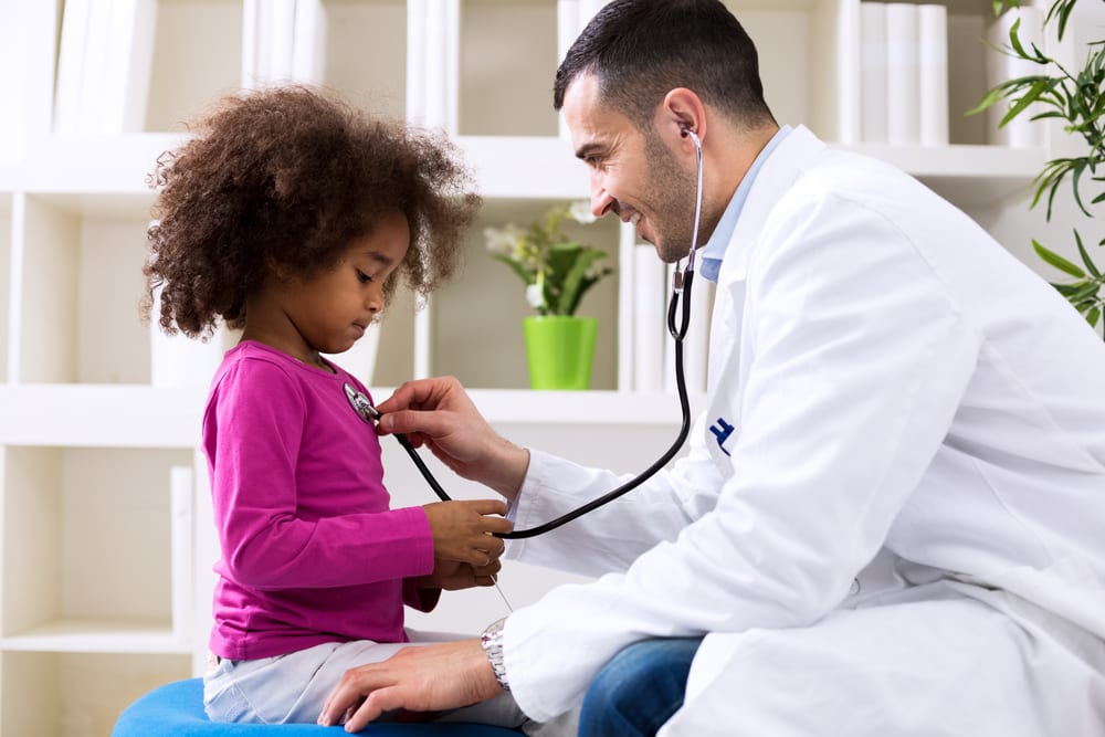 Pediatrician,And,Little,African,Girl,At,Hospital